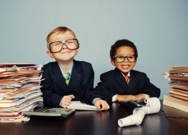 Young Accountants Two child accountants are ready and willing to look at your finances. Do your numbers add up? receipt photos stock pictures, royalty-free photos & images