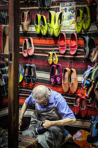 Sehitkamil, Gaziantep, Turkey - August 31 2017: Senior man in his shoe repair shop