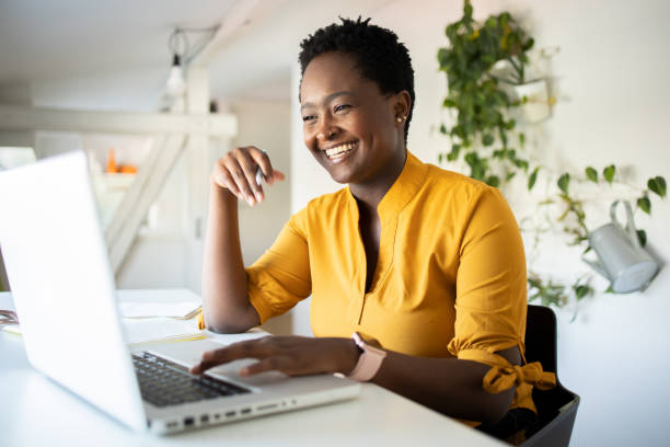 istock Young fashionable woman working at home 1431745410