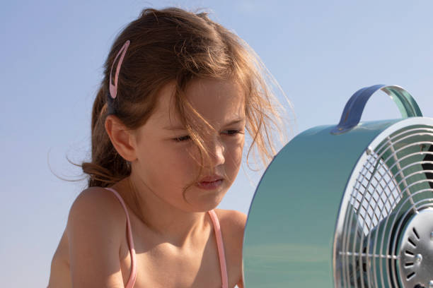 istock Girl with Fan 1431748562