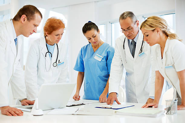 istock Healthcare Workers in a Doctor's Office 143174976