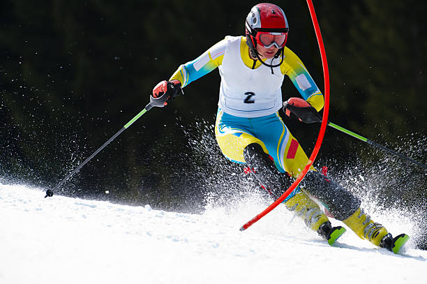 istock Young woman at slalom ski race 143175001