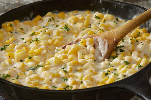 Skillet Creamed Corn with Garlic and Parmesan Cheese