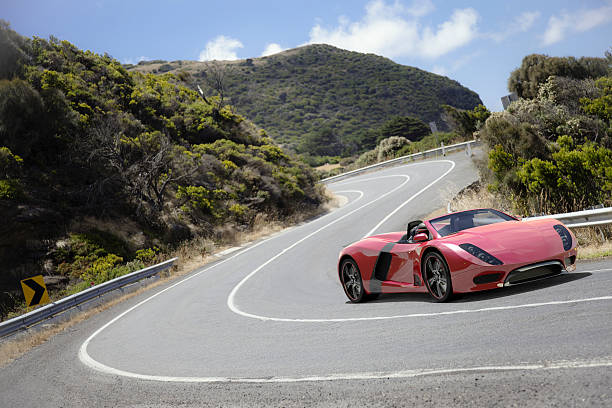 samochód sportowy na droga nadbrzeżna - ferrari car red status car zdjęcia i obrazy z banku zdjęć