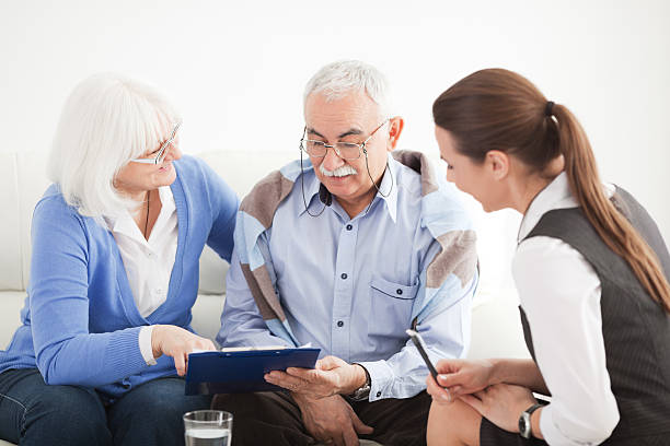 istock Senior couple with consultant. 143175711