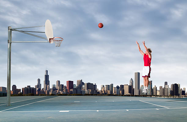 Basketball Court Outdoors And A View Of Tall Building In Te Back In Dubai.
