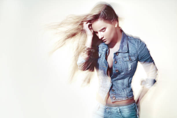 istock woman wearing jeans closing looking down 143176042