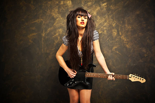 Young woman rock star isolated