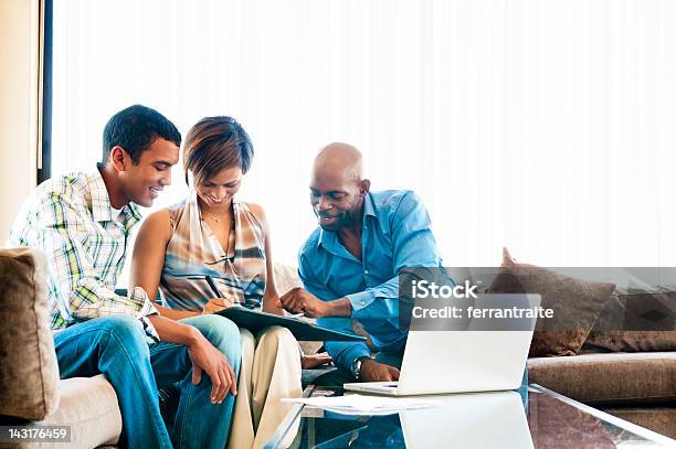 Financial Advisor Stock Photo - Download Image Now - Financial Advisor, Customer, Signing