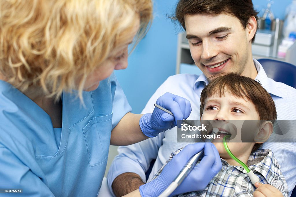 Father and child at dentist office Female Dentist doing dental drill teeth of smiling little boy sitting on father's lap in a dentist chair. selective focus to little boy.
[url=http://www.istockphoto.com/search/lightbox/11952685][img]http://www.photoama.com/family2-photoama.jpg[/img][/url]
[url=http://www.istockphoto.com/search/lightbox/9275877][img]http://www.photoama.com/healthcare-photoama.jpg[/img][/url] Boys Stock Photo