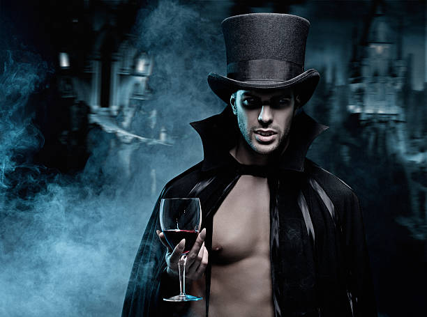 istock Vampire holding glass of blood 143176766