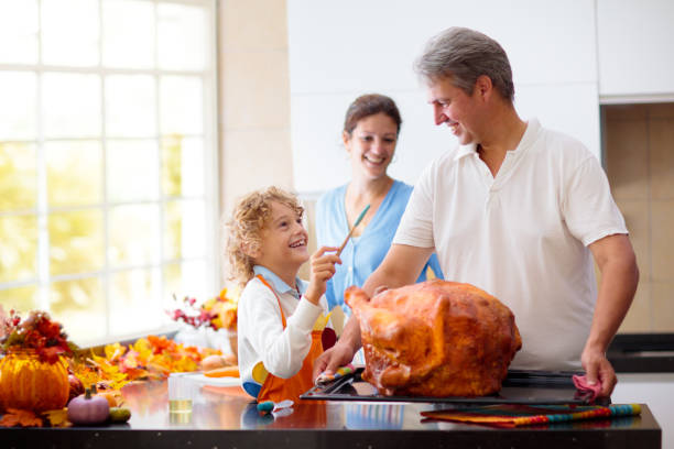 istock Family cooking Thanksgiving dinner 1431769388