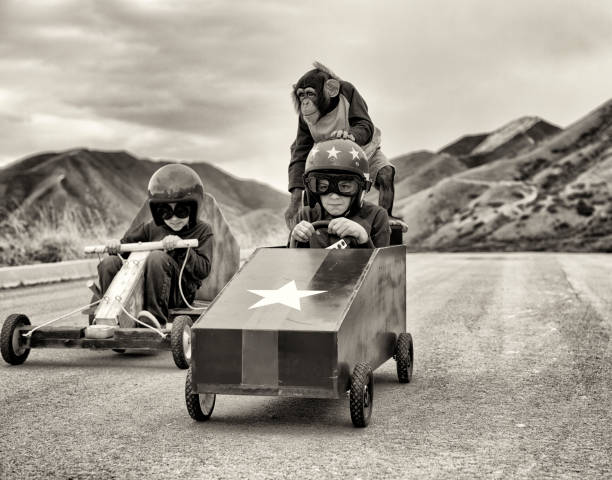 The Race A race to remember. Strap in and see how far they will take you. Vintage toned. soapbox cart stock pictures, royalty-free photos & images