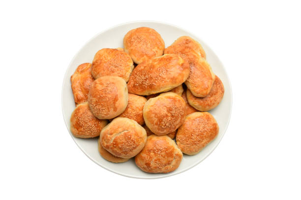 istock Pastry, Turkish pastries pogaca in a plate (Clipping Path) 1431772365