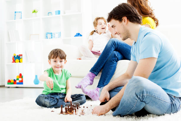 istock Family Playing Games Together at home. 143177752