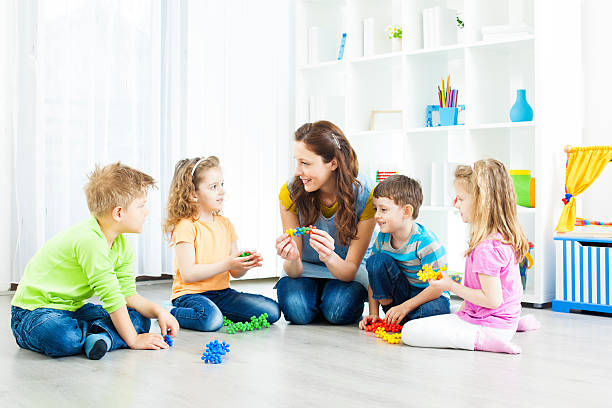 istock Preschool: Children Having Activities with Blocks Puzzle. 143177790
