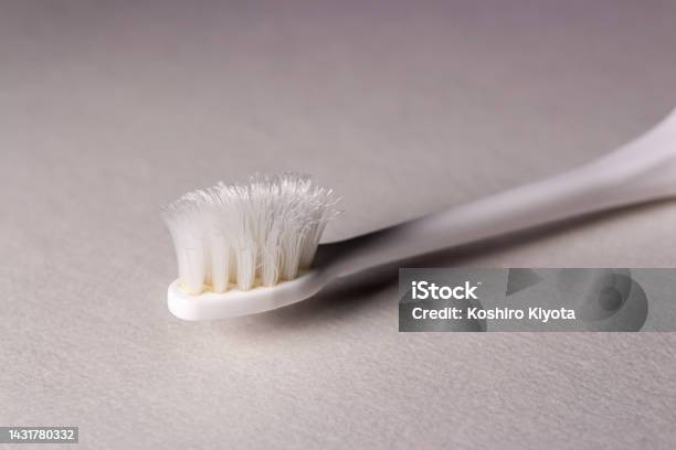 Closeup Old Toothbrush On White Background Stock Photo - Download Image Now - Bathroom, Close-up, No People