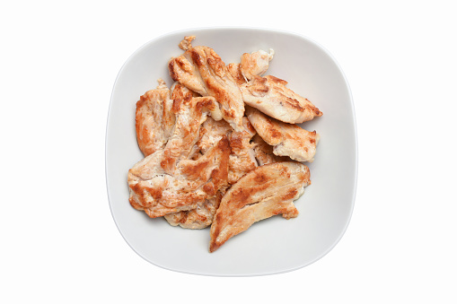 High angle view grilled chicken breast meat in a plate isolated on the white background with clipping path