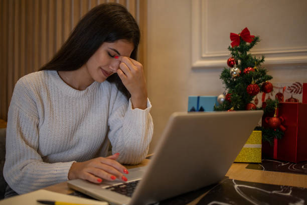 istock Happy woman celebrating Christmas 1431784404