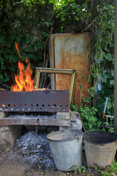 istock a fire in an old brazier in a dump of things 1431785946