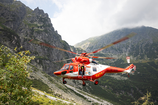 Rescue helicopter in the austrian alpes