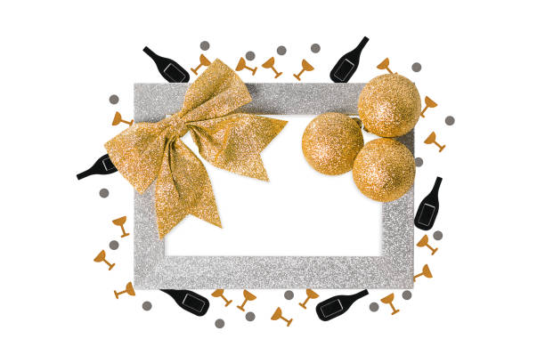 A blank card with gold and cream ribbons on a light blue background, with copy space.