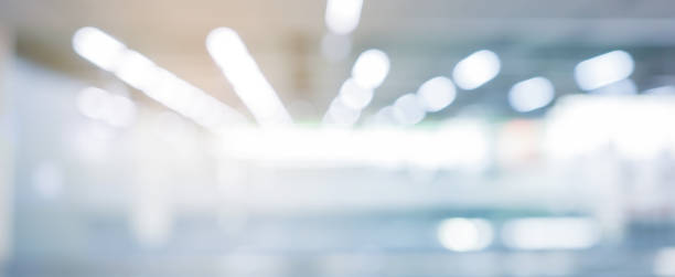istock Abstract blurred inside interior of hospital building background with shine light for advertisement design and show content concept 1431799505