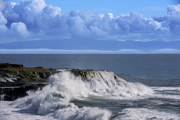 istock Huge Ocean Waves Crashing on Coastal Rocks 1431802723