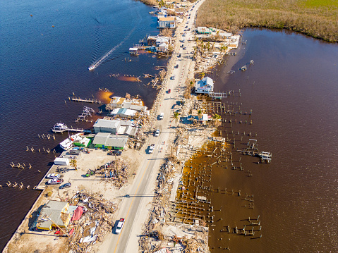 Aerial drone inspection photo Matlacha Florida Hurricane Ian aftermath damage and debris from flooding and storm surge Circa October 2022