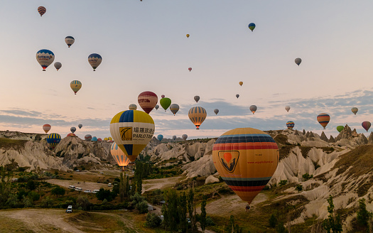 Sunrise with hot air balloons in Cappadocia, Turkey balloons in Cappadocia Goreme Kapadokya, and Sunrise in the mountains of Cappadocia Turkey July 2018