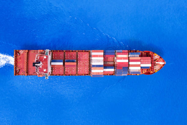 high angle view of the shipping system transport containers by cargo ships, international transport, export-import business, logistics stock photo