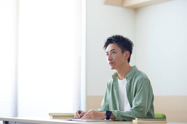 istock Young Japanese student studying in the classroom 1431838554