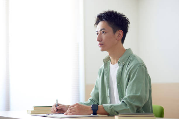 istock Young Japanese student studying in the classroom 1431838559