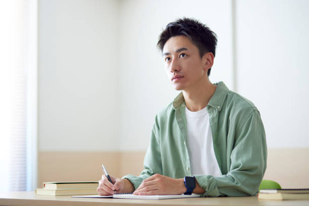 istock Young Japanese student studying in the classroom 1431838564