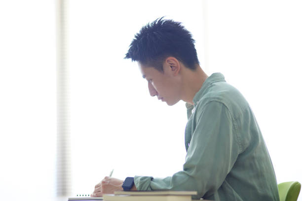 istock Young Japanese student studying in the classroom 1431838566