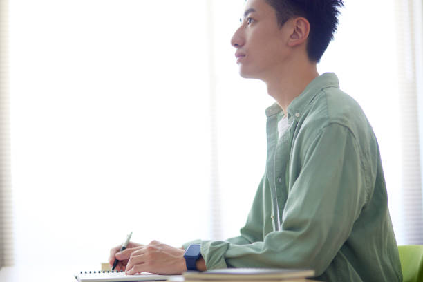 istock Young Japanese student studying in the classroom 1431838571