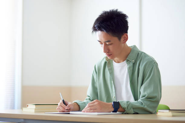 istock Young Japanese student studying in the classroom 1431838572
