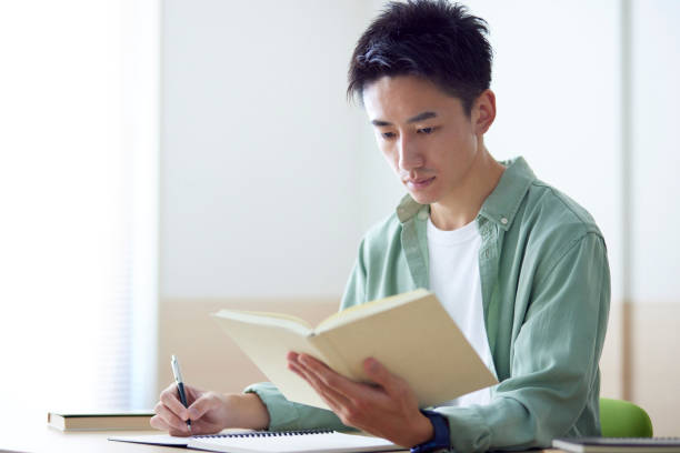 istock Young Japanese student studying in the classroom 1431838586