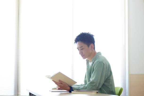 istock Young Japanese student studying in the classroom 1431838589