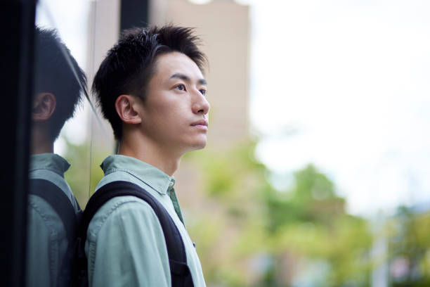 istock University campus and young Japanese student 1431839184