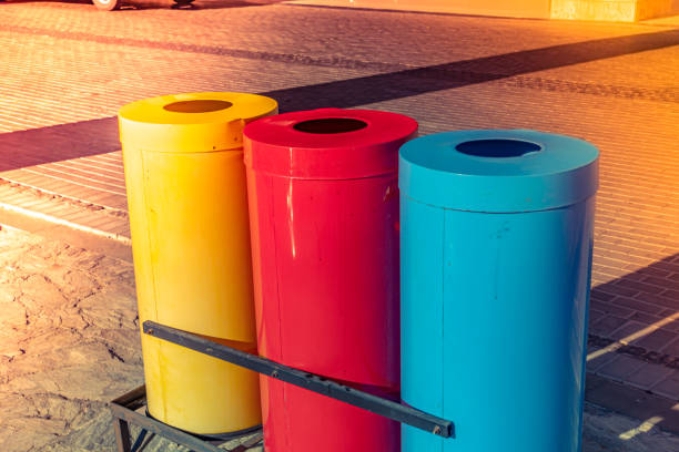istock Multi-colored garbage containers for separate collection of waste. Separate waste collection for recycling and ecology 1431843340