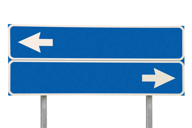 istock Right and left crossroads route direction pointer two way signpost road sign, white traffic arrow frame, blank empty guidepost copy space background, blue isolated roadside signage, grey pole post, large detailed horizontal closeup 1431852438