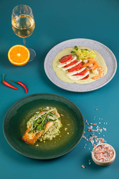 istock spanish seafood paella, Various protein sources concept - rib eye, dorado, pork, egg. 1431860285