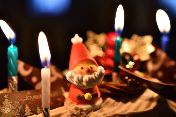 Christmas cake decorated with Santa Claus candy.