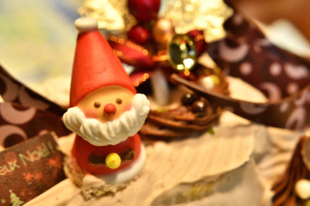 istock Christmas cake decorated with Santa Claus candy. 1431860459