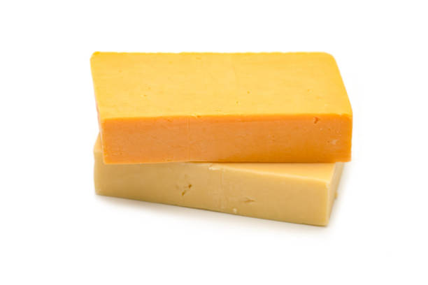 istock White and red cheddar on wooden board 1431862141
