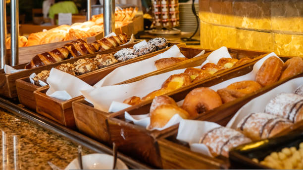 istock Buffet breakfast in luxury hotel with fresh pastry, donuts and bakery 1431874089
