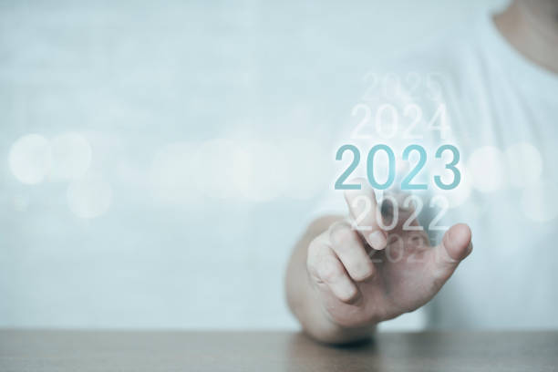 istock Pointing with a finger on a virtual interface in the year 2023,
Plans to accelerate corporate expansion and growth until 2023,
Beginning 2023 New Year's business planning 1431875324