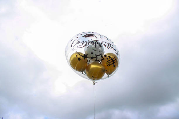 Graduation balloons are used to congratulate graduates.