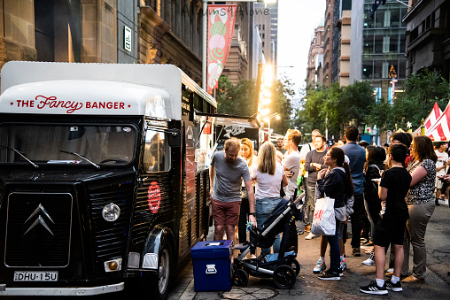 SYDNEY, AUSTRALIA. - On November 27, 2019 - Night Street food festival Sydney on Pitt street set to come to life, food stall with people on the line.